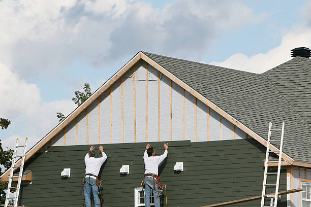 Professional Siding Repair technician working in Brookville, OH